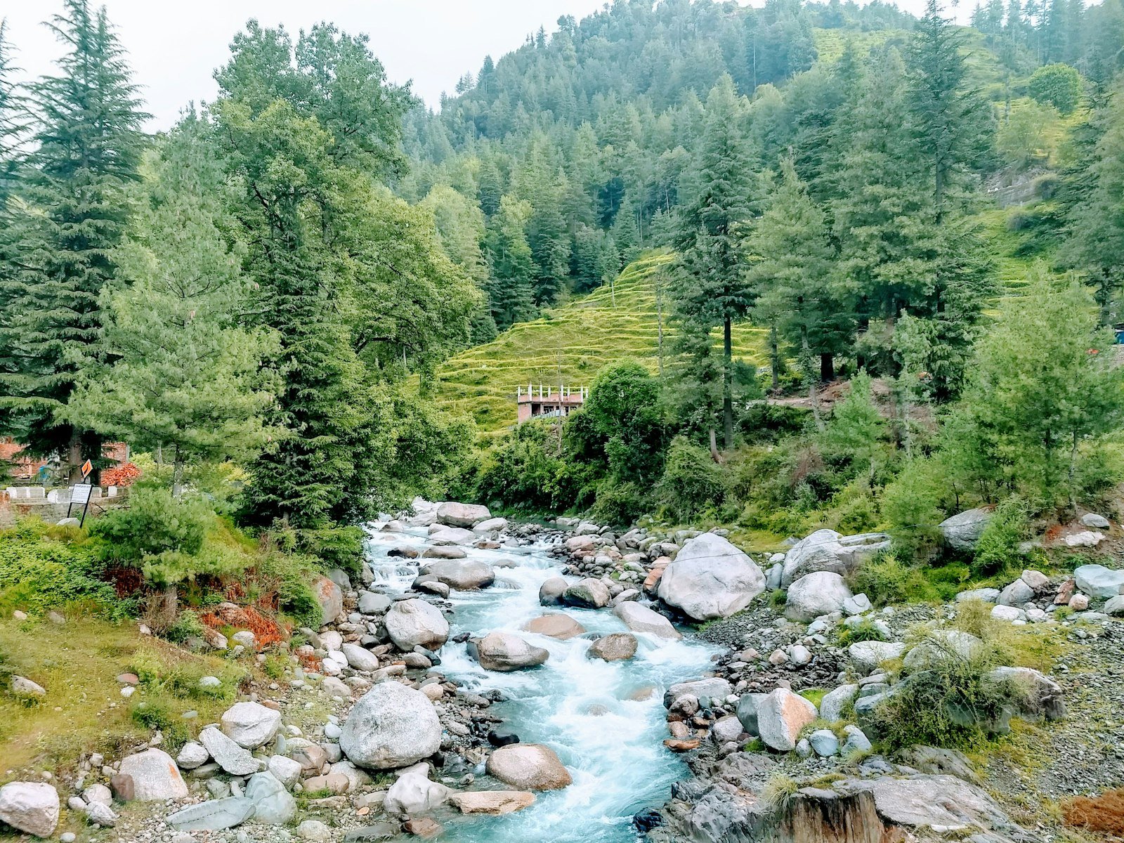 Snow peaks above a mountain village - Himachal Pradesh · The Subcontinent